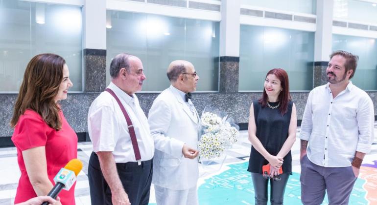 PBH recebe a visita do ator Pascoal da Conceição interpretando Mário de Andrade Prefeito Fuad Noman recebendo a visita na PBH