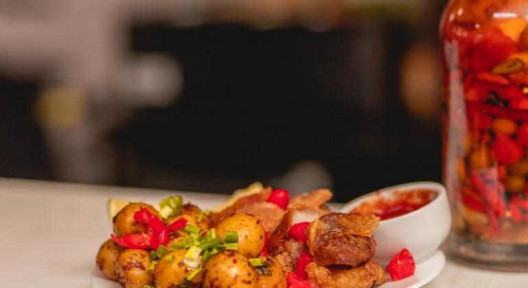 Belotur apresenta ações para a gastronomia, em evento internacional em Paraty Prato de culinária mineira