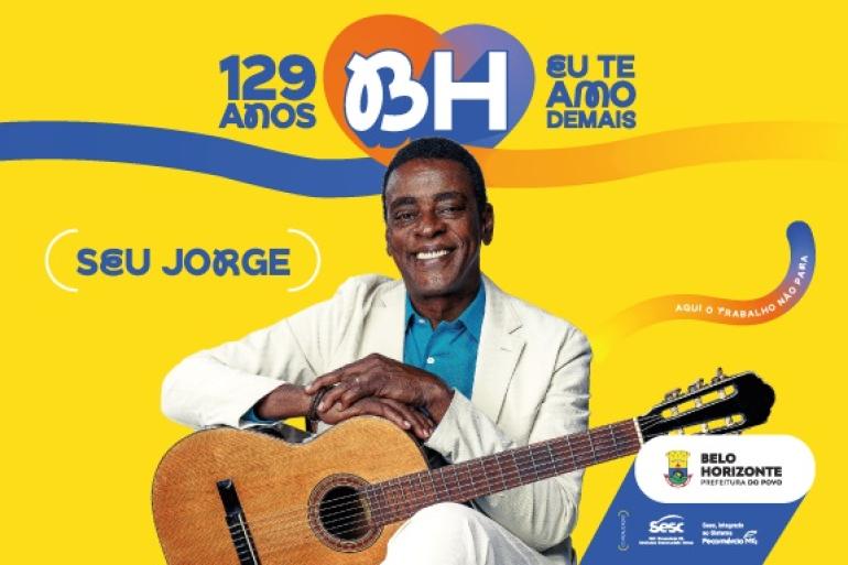 Seu Jorge reforça a programação do aniversário de 129 anos de BH no dia 11 de outubro Arte mostra Seu Jorge com um violâo. Ele estávestido com um terno branco e uma camisa azul. O fundo é amarelo, traz alogo da PBH e a inscrição 129 anos - BH Eu te amo.