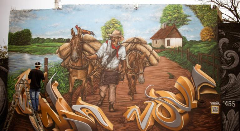 Colorindo Venda Nova é finalizado com mural em homenagem aos tropeiros