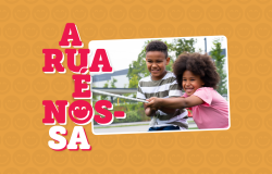 banner A Rua é Nossa, título do programa em rosa, sobre fundo laranja. Imagem de duas crianças negras, brincando de cabo de guerra. 